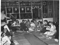 Skyline Club, Burtonwood, 25 June 1958, Stop over Tokyo, eating sukiyaki, airmen & guests in lounge, assist Dir Helen Dorning talking to guests