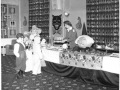 Skyline Club, Burtonwood, Childrens Halloween Part 1958, Shirley Makin, Ass club Director serving toffee apples